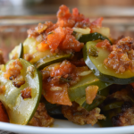 Zucchini Sausage Casserole is a delicious and hearty casserole to make for dinner any night of the week. Sausage and Zucchini Casserole Recipe is an easy and tasty way to use up extra zucchini from the garden.