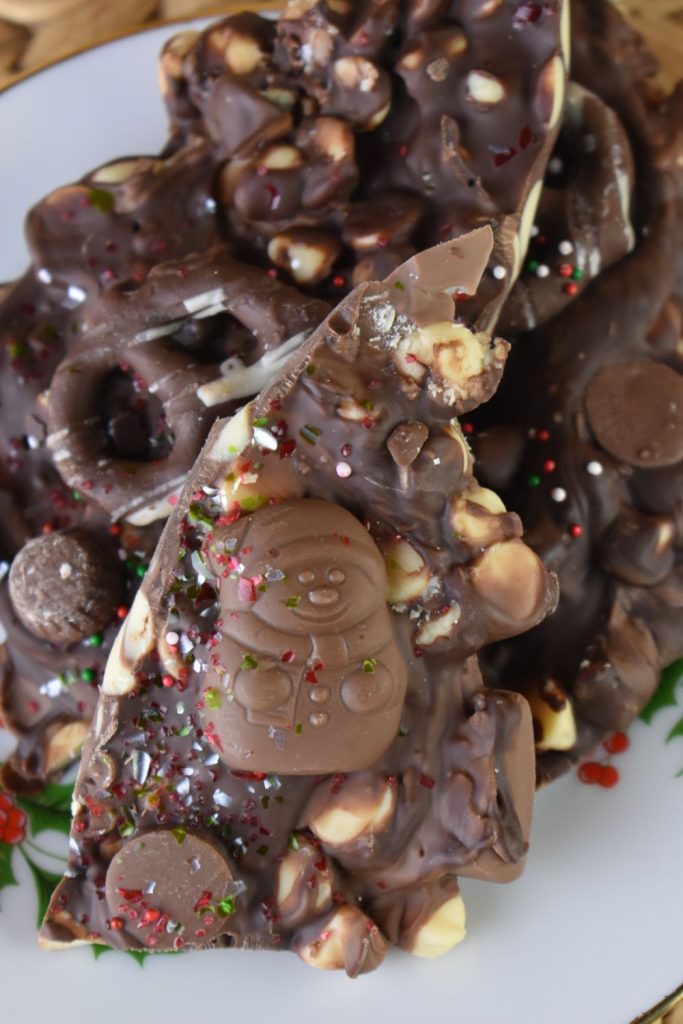Chocolate Bark Candy can be topped with your favorite sweet treats like chocolate-covered pretzels and mini peanut butter cups.