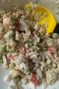 This cold seafood salad, made with shrimp and crab (krab meat also called surimi) is positively tasty with its lemon dill dressing.