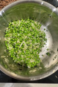 Minted peas with caramelized onions is an easy vintage side dish made with frozen peas, sweet onions and fresh mint.