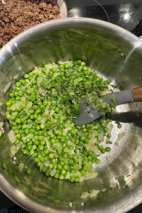 Minted peas with caramelized onions is an easy vintage side dish made with frozen peas, sweet onions and fresh mint.