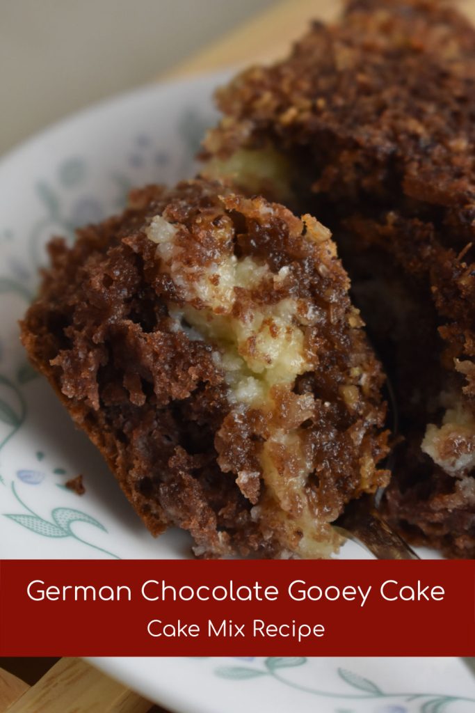 bite of german chocolate gooey cake on a plate