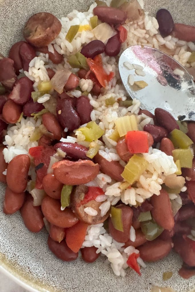This old-fashioned Louisiana red beans and rice recipe is made in the slow cooker with smoked sausage and pantry staples. Easy, comforting, and freezer-friendly.