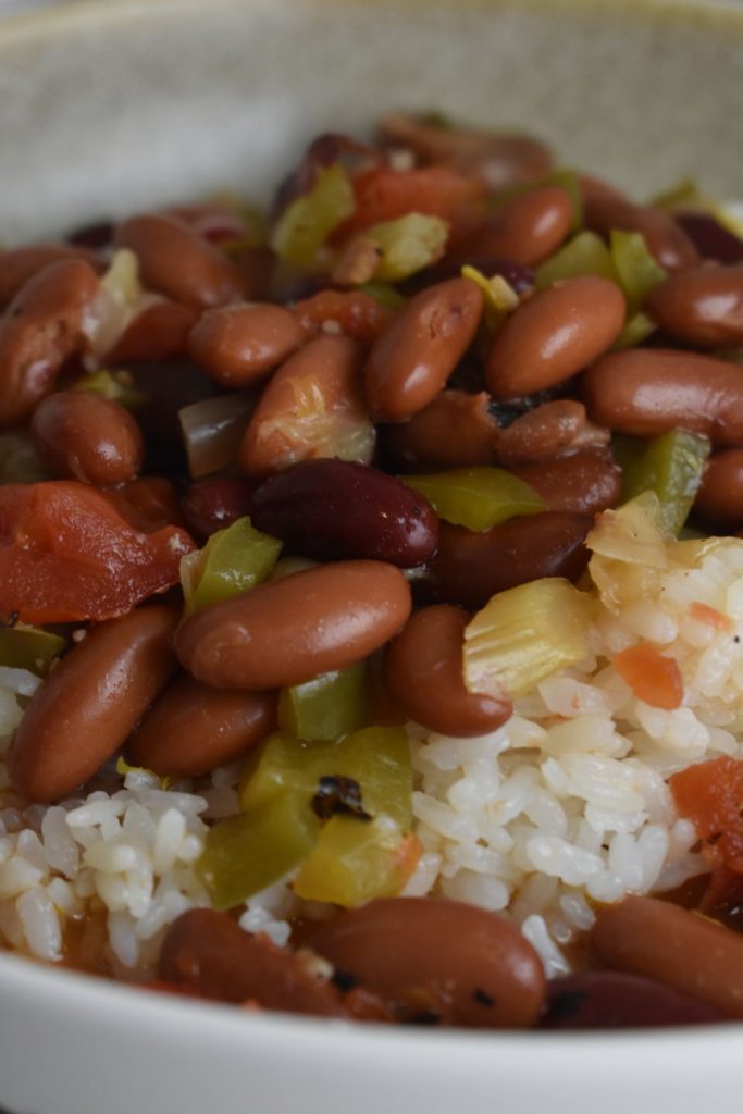 This old-fashioned Louisiana red beans and rice recipe is made in the slow cooker with smoked sausage and pantry staples. Easy, comforting, and freezer-friendly.
