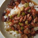 This old-fashioned Louisiana red beans and rice recipe is made in the slow cooker with smoked sausage and pantry staples. Easy, comforting, and freezer-friendly.