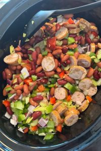 This old-fashioned Louisiana red beans and rice recipe is made in the slow cooker with smoked sausage and pantry staples. Easy, comforting, and freezer-friendly.