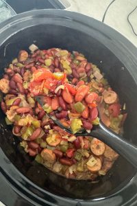 This old-fashioned Louisiana red beans and rice recipe is made in the slow cooker with smoked sausage and pantry staples. Easy, comforting, and freezer-friendly.