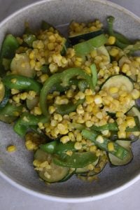 This easy old-fashioned zucchini and corn skillet is a quick 10-minute side dish made with garden zucchini, sweet corn, and peppers.