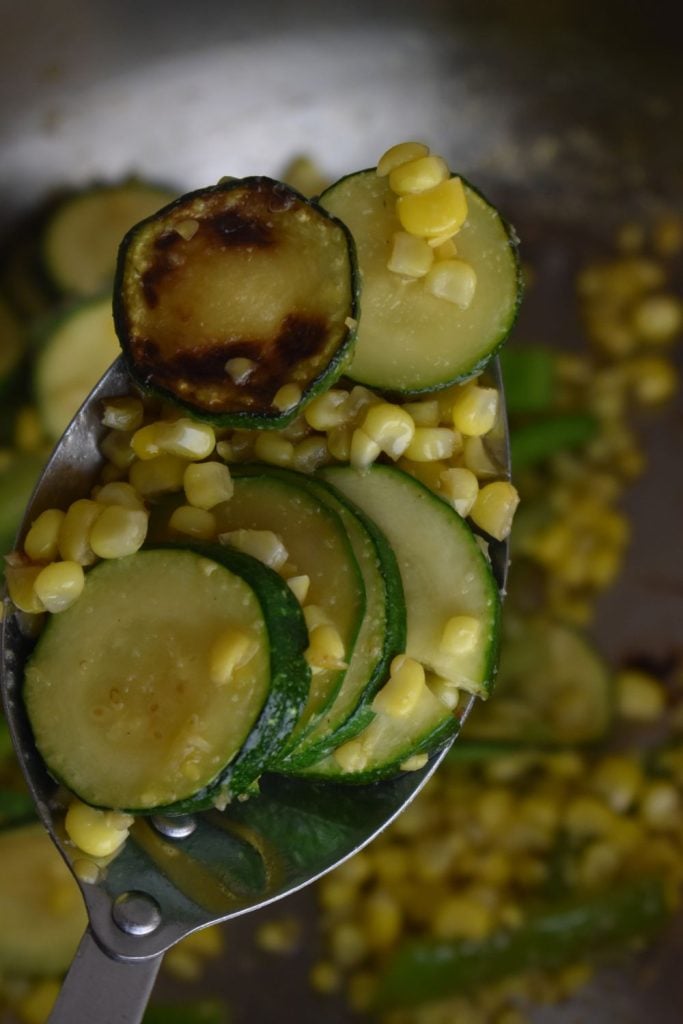 This easy old-fashioned zucchini and corn skillet is a quick 10-minute side dish made with garden zucchini, sweet corn, and peppers.