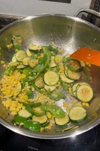 This easy old-fashioned zucchini and corn skillet is a quick 10-minute side dish made with garden zucchini, sweet corn, and peppers.