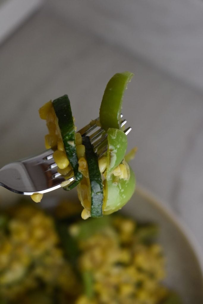 This easy old-fashioned zucchini and corn skillet is a quick 10-minute side dish made with garden zucchini, sweet corn, and peppers.