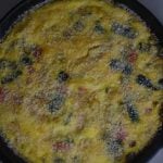 This old-fashioned vegetable frittata is an easy skillet recipe made with eggs, fresh vegetables, and Parmesan cheese.