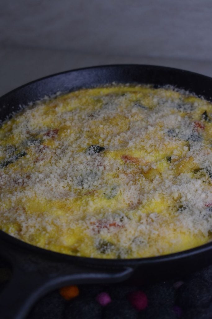 This old-fashioned vegetable frittata is an easy skillet recipe made with eggs, fresh vegetables, and Parmesan cheese.