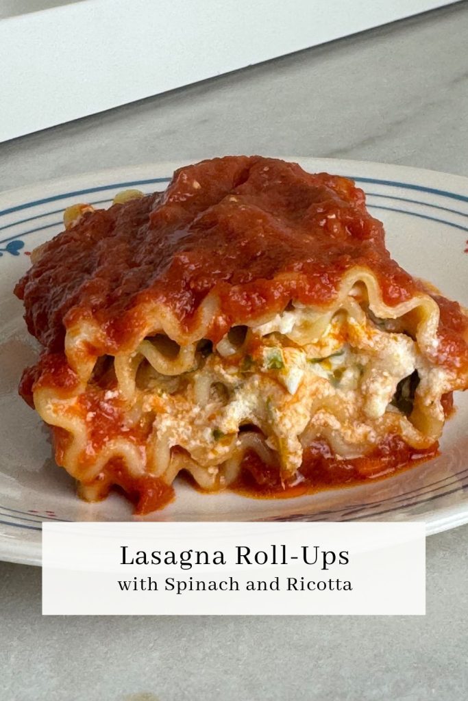 Close up, side view of spinach ricotta lasagna rollup with text box